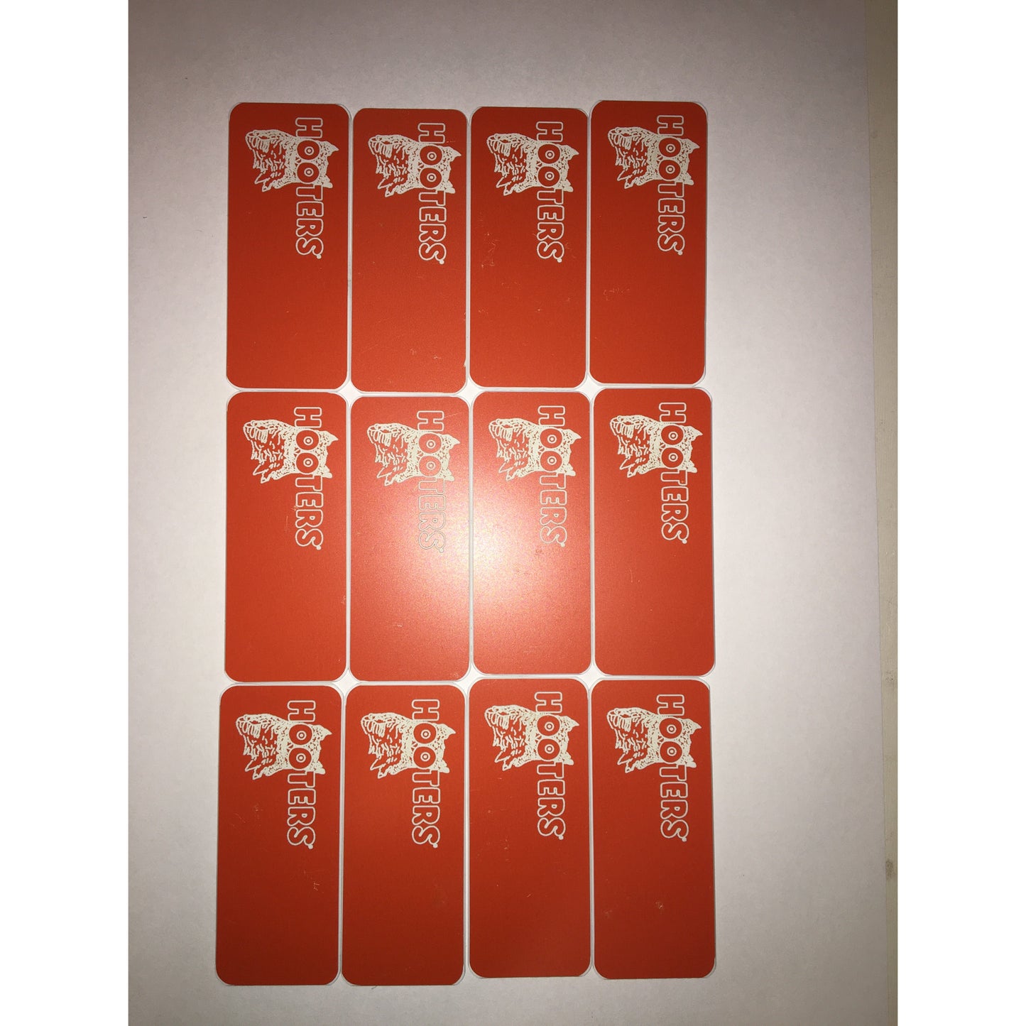 Hooters blank nametag with scratches