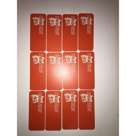 Hooters blank nametag with scratches