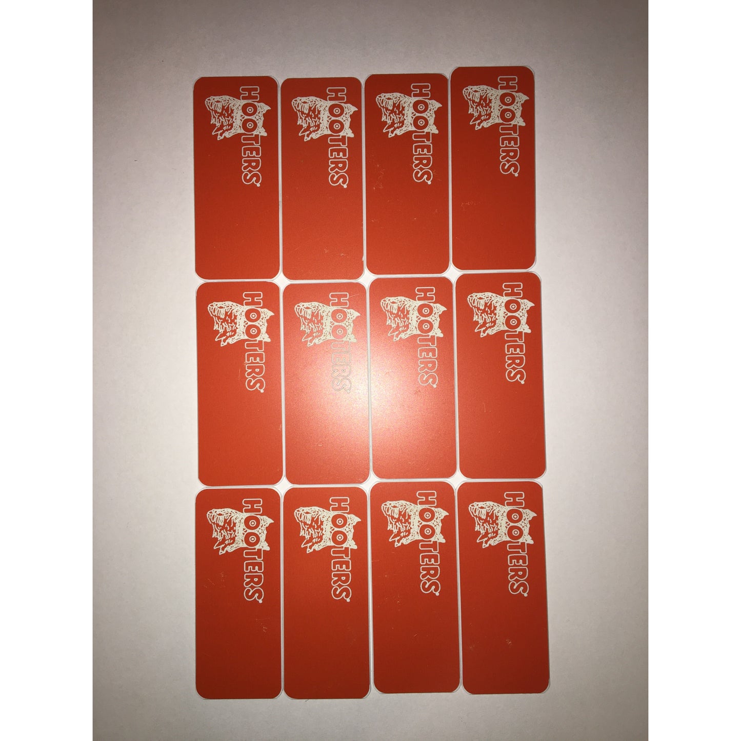 Hooters blank nametag with scratches 1